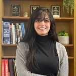 Headshot photo of Eminé Fidan